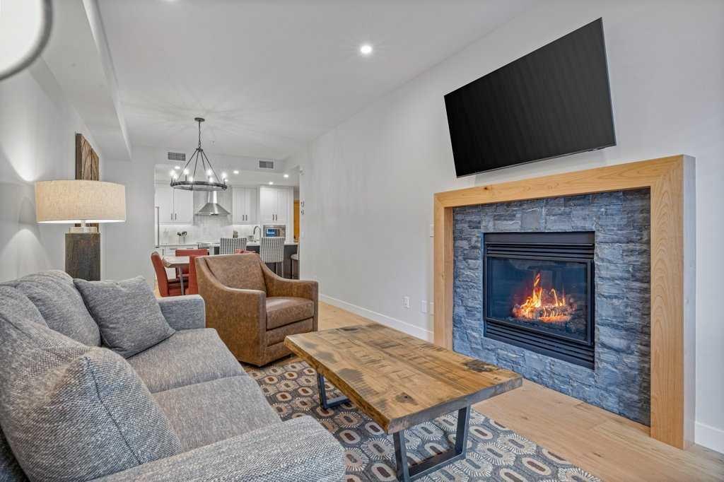 BergTraum living room with stone fireplace